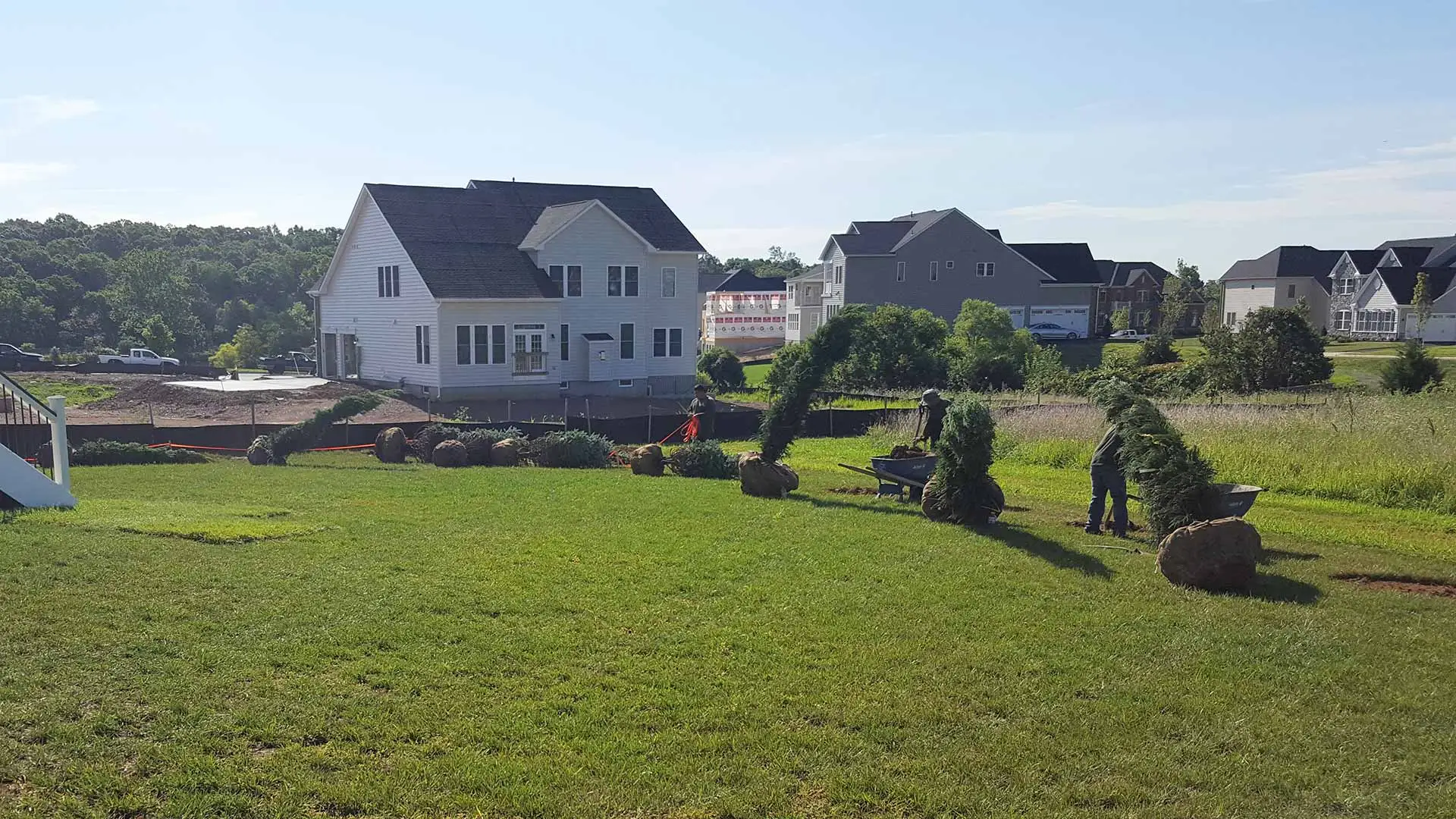 Lawn care crew working in Bristow, VA.