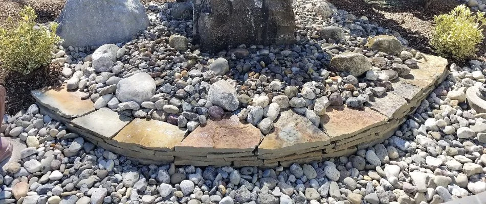 Rocks in a landscape near a water feature in Bristow, VA.